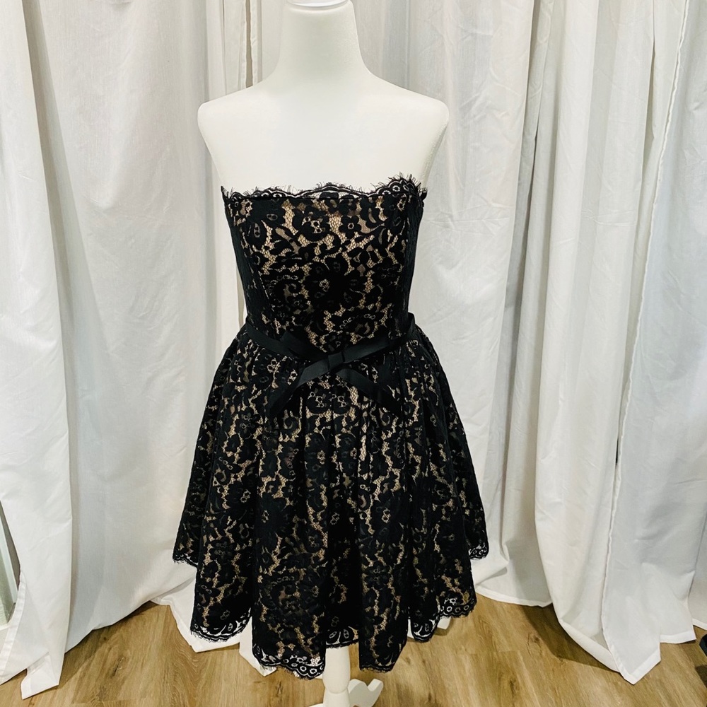 Robert Rodriguez black lace dress.